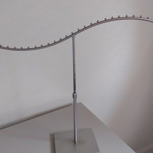 Industrial-look metal jewelry holder